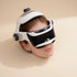 CalmHelm Massager product photo on a warm beige background